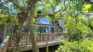 Front deck with dining table and gas grill