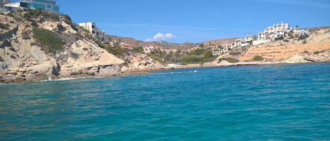 Looking from the boat to shore and Villa Sueño La Mar Residence