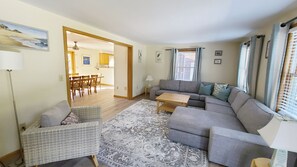 Comfortable living room opens to dining area