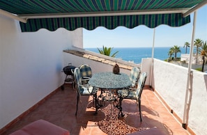 Terrace dining area with great sea views