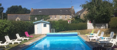 Swimming Pool with Owners House and Gites in Background