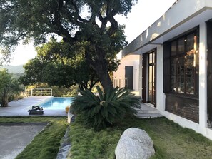 Clean architectural lines of the Villa Horizon and its landscaped garden