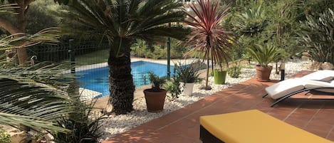 View of the pool from our garden terrace.
