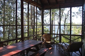 Big cabin screened porch looking over the lake