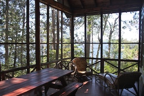 Big cabin screened porch looking over the lake
