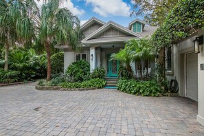 Front entrance with custom glass door