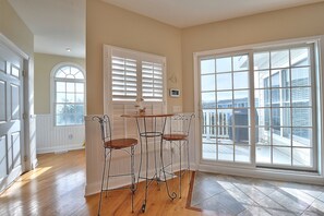 Floor 3: Cafe table facing terrace off dining area and kitchen