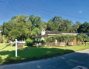 Corner lot with side parking access for boat and trailer and driveway. 