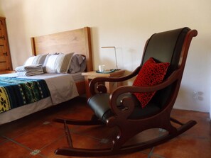 Guests bedroom with Queen bed, Reading chair from local craftsman