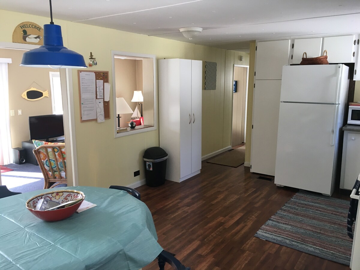 Comfortable water front cottage with spectacular views and memorable sunsets.