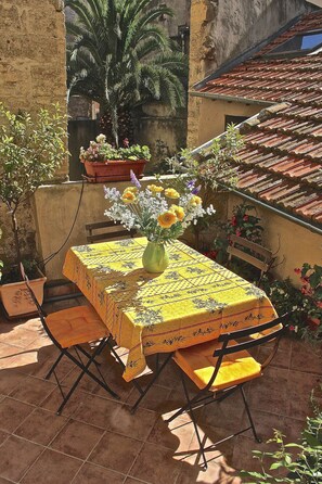The sunny terrace brings outdoor living to a new level.