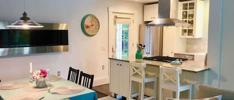 view of open plan downstairs with kitchen, living and dinning.