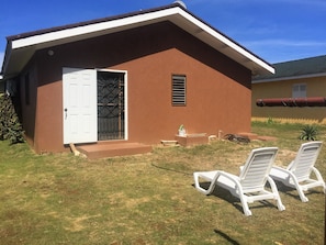 Lots of yard space to just bathe in the sun, assisted by two lounge chairs