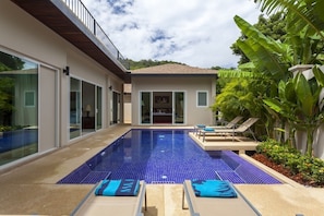 The 8 x 4 metre private swimming pool, with feature sun deck