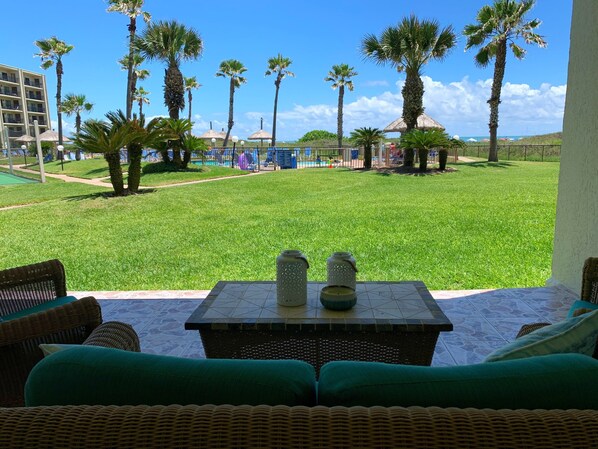 Walk right off patio to pool or beach. Great views & convenient!
