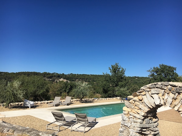 Swimming pool with view over Abbaye de Saint Hilaire