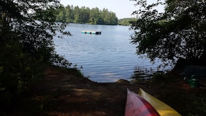 View from small beach to swimming dock.
