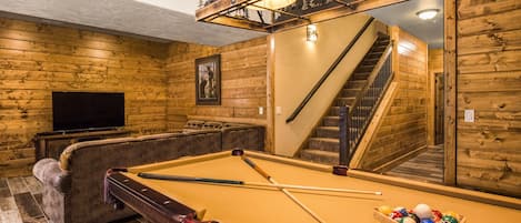 Play some pool in the lower level of your lodge