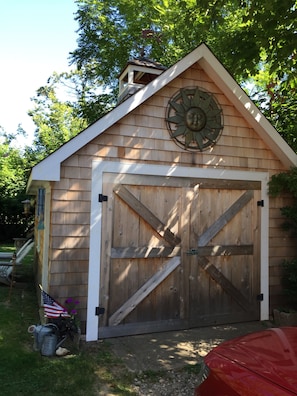 Barn holds coolers, beach chairs, BBQ and room for bikes
