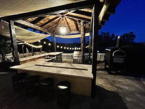 Entire outdoor kitchen with pizza oven