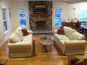 formal living room with sunbrella sofas with one sofa pull out 