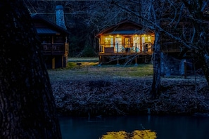 Pigeon Forge River Cabin "Dancing Waters" - River and cabin at night