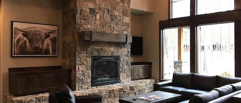 Great Room with gas fireplace, 55" TV,  & custom leather couches