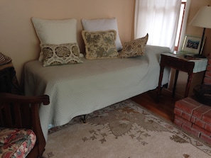 Daybed in Living Rm is a real twin! Creates a guest bed plus extra seating.