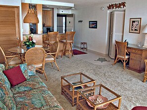 Living room looking toward entry and hallway to bedroom & bath.