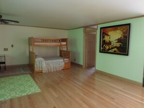 Full lower bunk bed with twin upper bunk