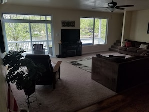 You walk into the living room and immediately have great views of the lake.