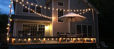 Back deck with cafe lighting.