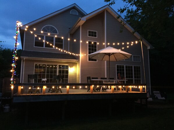 Back deck with cafe lighting.