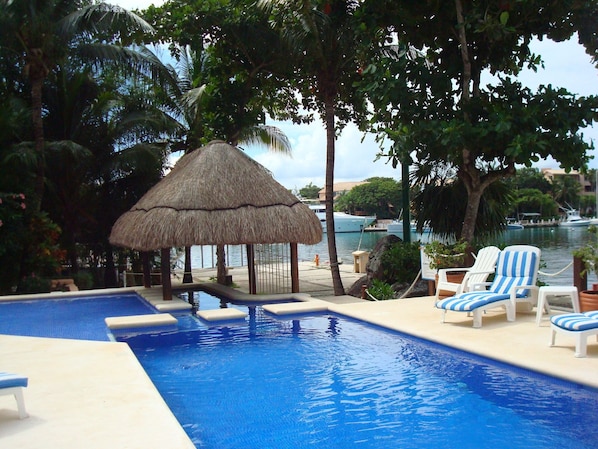 Marina view, palapa, swim bar, swings, different water levels