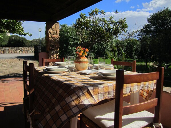 Comfortable porch overlooking the private garden