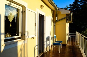 Front entrance with a balcony