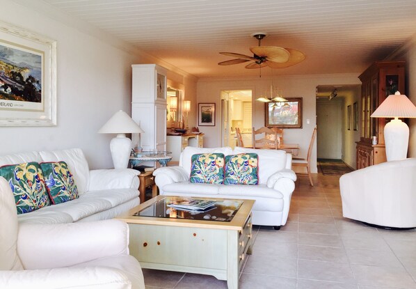 Living Area with leather couches, recliner, and seat.