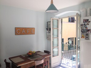 Eat in kitchen connects to south-facing balcony.