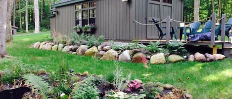 Bear's den nestled in a park-like setting on Mirror Lake Drive in Lake Placid.