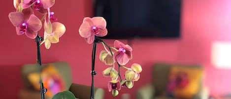 Fresh flowers in the comfortable, modern living room.