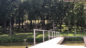 View of pier and shoreline and some of the many mature oak trees