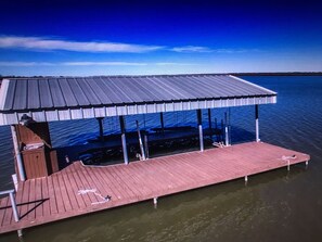 Relax on the boathouse deck, take a dip in the lake, or tie alongside the pier