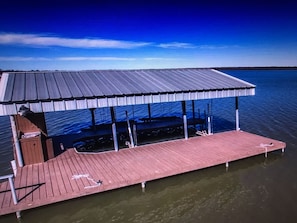 Relax on the boathouse deck, take a dip in the lake, or tie alongside the pier