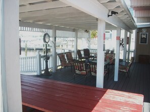 Full view of seating area and picnic table