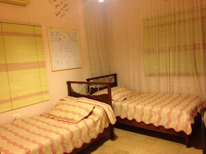 2nd Bedroom: 2 single beds