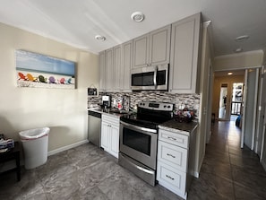 Beautiful kitchen with stainless appliances