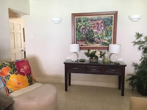 The condo features many beautiful local original works of art