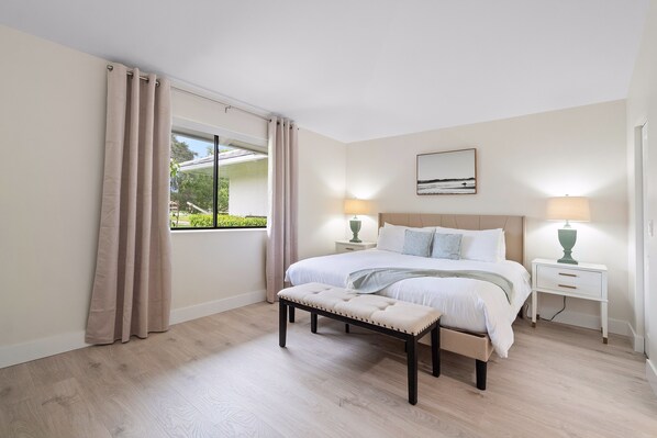 Spacious and bright master bedroom suite with an en-suite bathroom.
