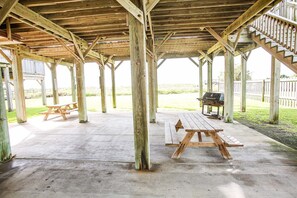 Picnic table and charcoal grill