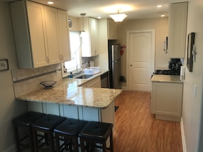 Kitchen with seating and plenty of cabinet space